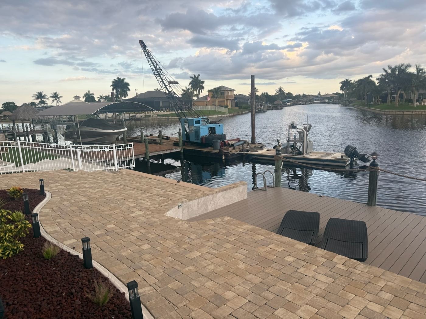 Setting new pilings from our crane barge