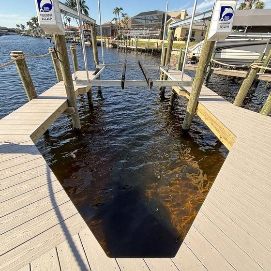 Boat slip with boat lift, Slate Gray vinyl decking and rope rail