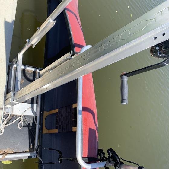 Top view of a hand-crank canoe lift arm