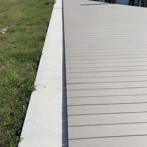 New seawall cap with a Slate Gray vinyl walkway running along it